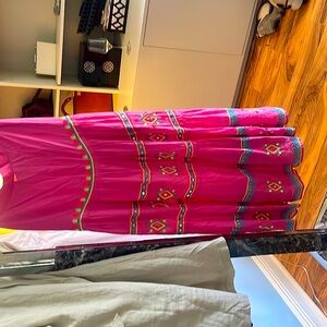 Long pink skirt with beautiful embroidery and appliqué